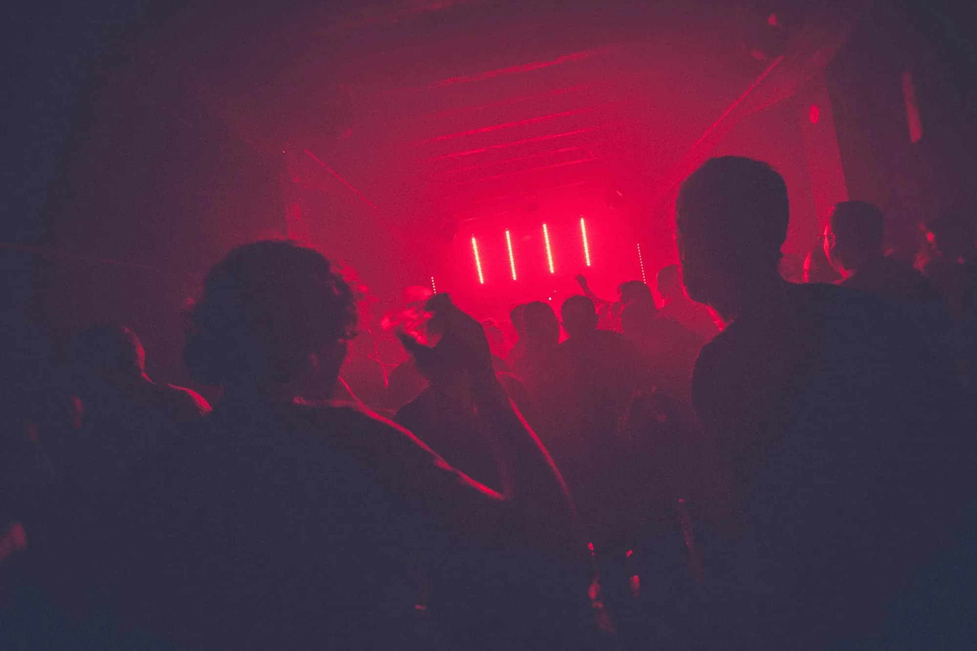 A dance floor washed in amber light